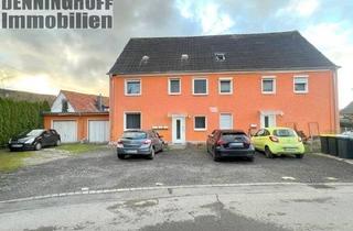 Bauernhaus kaufen in 58730 Fröndenberg, Fröndenberg/Ruhr - 4-Familienhaus mit Garagen und Stellplätzen in ruhiger Lage von Fröndenberg-Dellwig