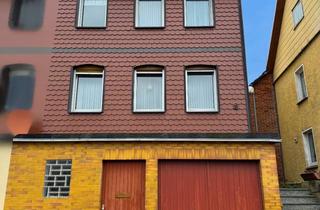 Wohnung kaufen in 37170 Uslar, Doppelhaushälfte mit Garage und Garten