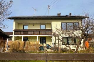 Wohnung kaufen in 82386 Huglfing, 3 - 4 Zi. Landhauswohnung mit Südbalkon, Garage, Stellplatz und Gartenanteil in sonniger Ortslage.